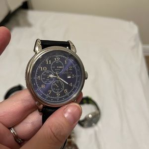 Invicta men’s watch. Blue face black leather band.